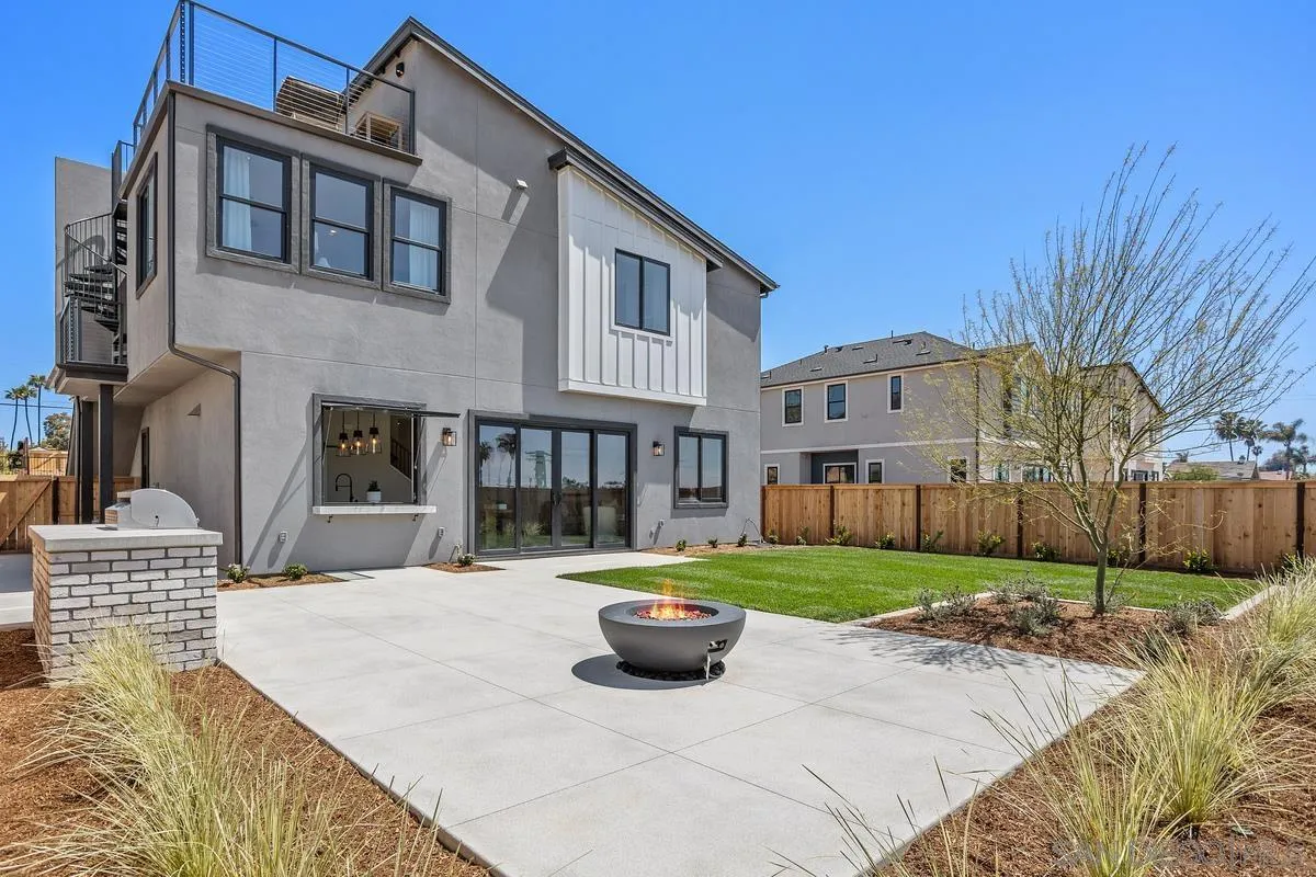 1748 Whaley Street Oceanside, CA 92054 - Photo 18 of 38 a view of a house with backyard and garden