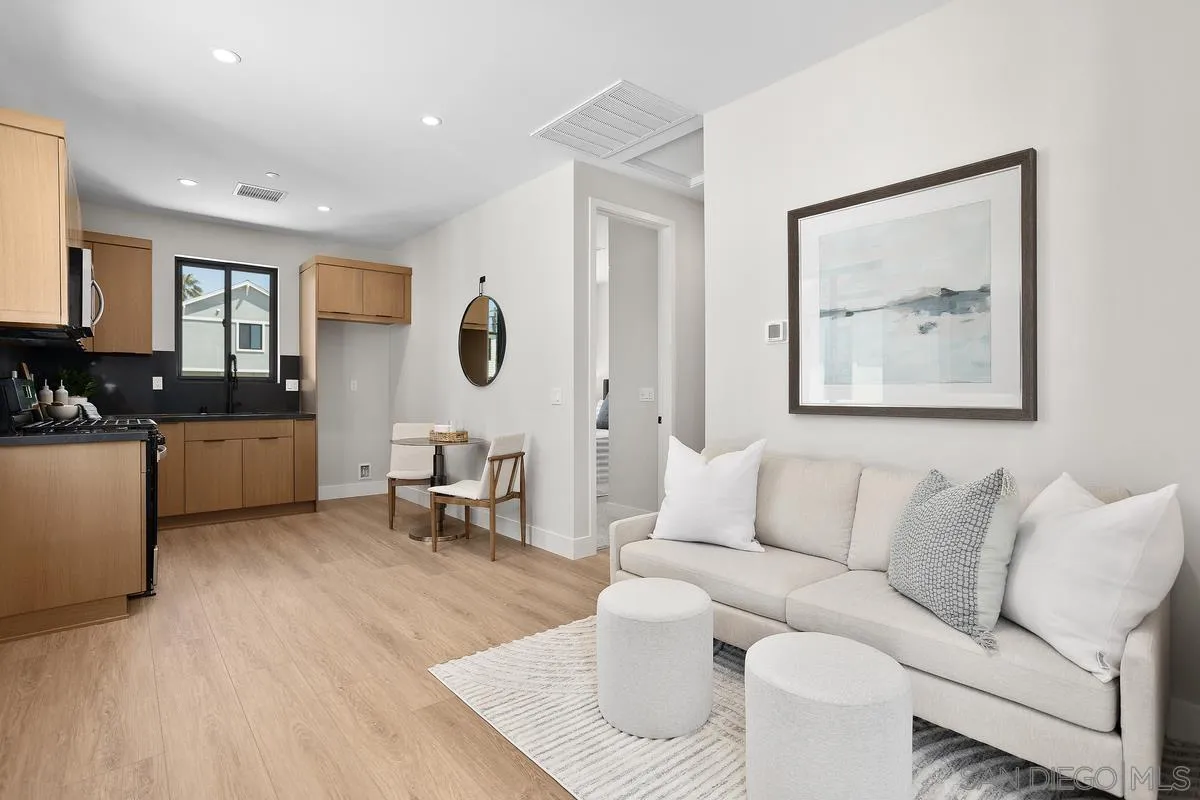 1748 Whaley Street Oceanside, CA 92054 - Photo 36 of 38 a living room with furniture and a large window