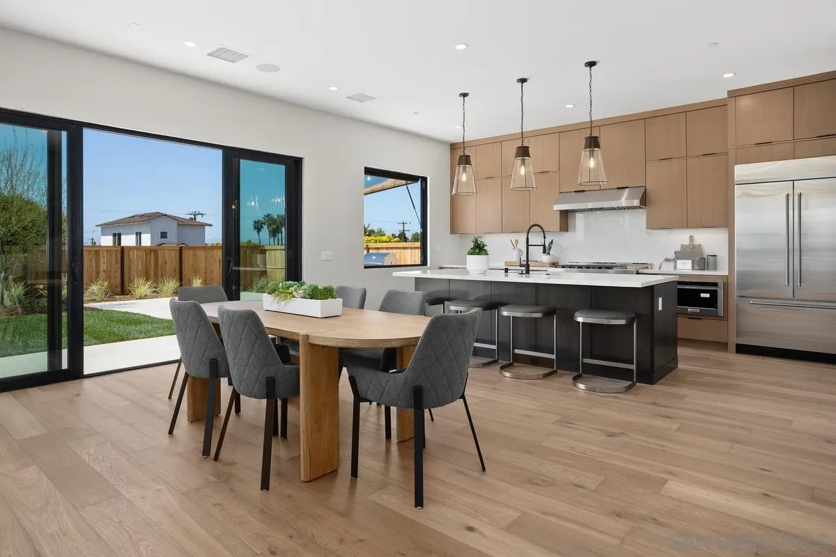 1748 Whaley Street Oceanside, CA 92054 - Photo 6 of 38 a view of a dining room with furniture window and wooden floor