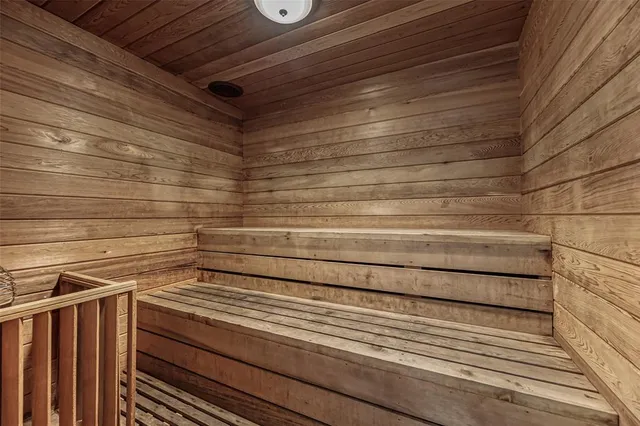 a room with furniture pool table and flat screen tv