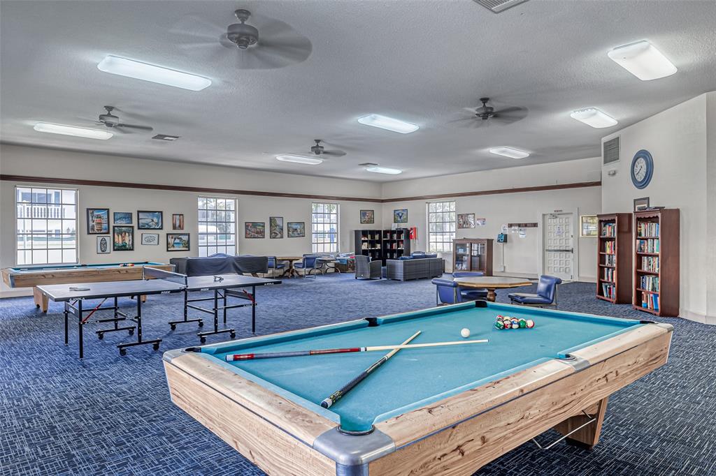 2220 Northeast 68th Street, Unit 1005 Fort Lauderdale, FL 33308 - Photo 18 of 25 a room with furniture pool table and flat screen tv
