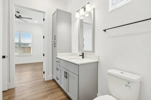 a view of a room with racks on the wall