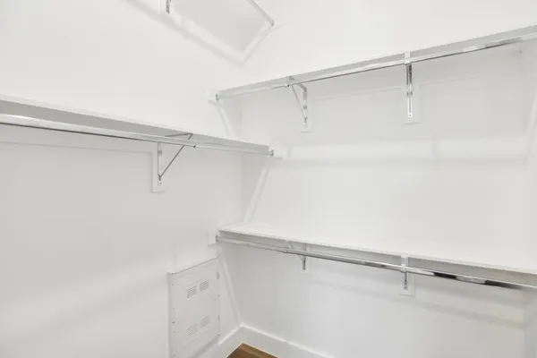 a view of a room with racks on the wall