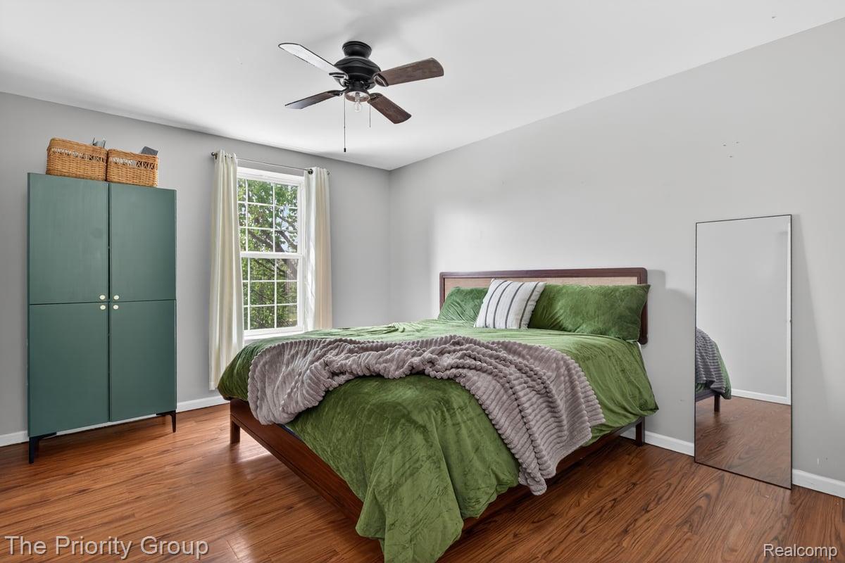 517 Deer Valley Road Holly, MI 48442 - Photo 39 of 61 Bright and spacious guest bedroom with wood-style floors and large closet