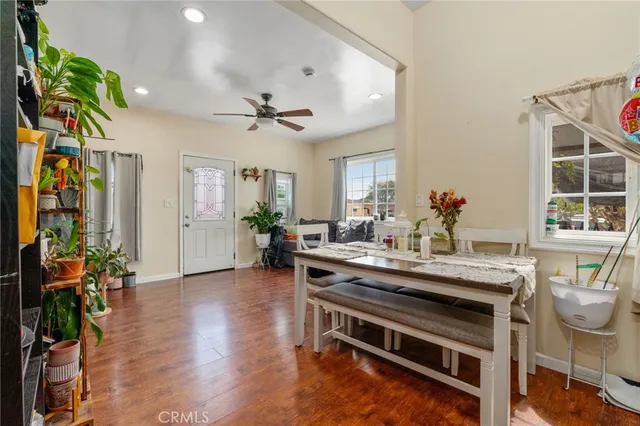 a bedroom with furniture toys and a window