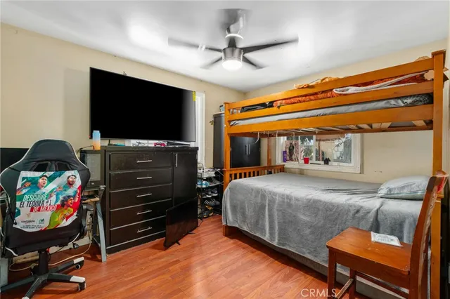 a bathroom with a sink mirror vanity and toilet