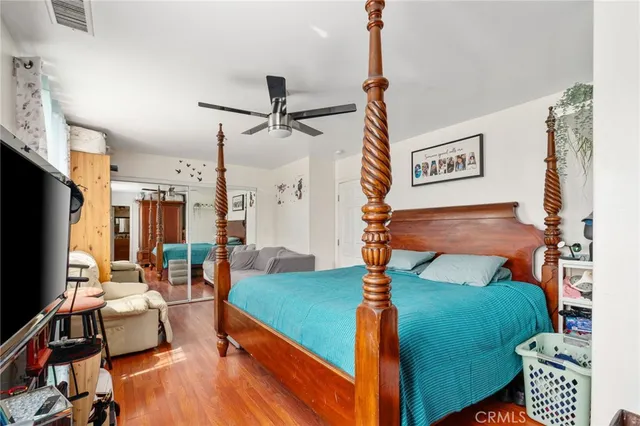 a bathroom with a double vanity sink toilet and shower