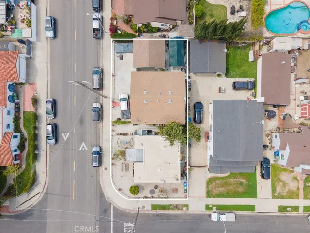 aerial view of a house with outdoor space