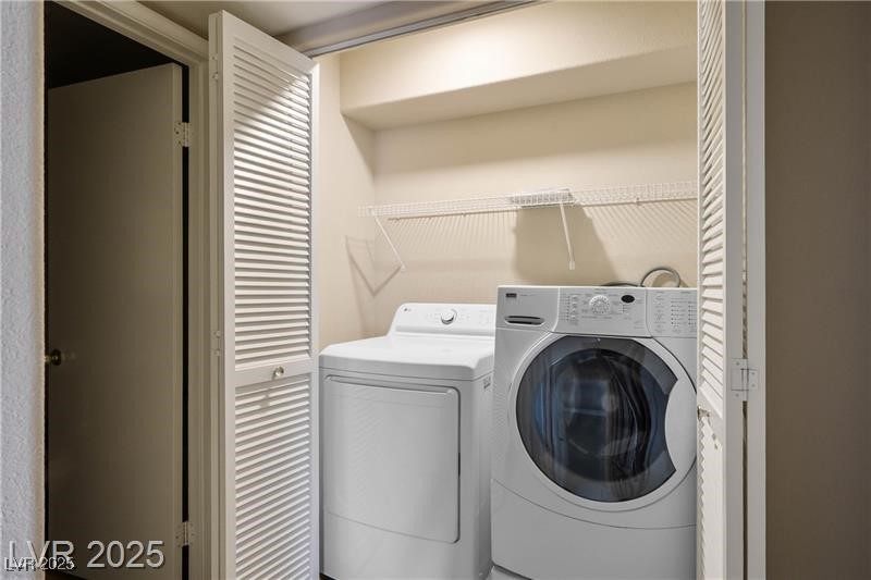 1575 West Warm Springs Road, Unit 2122 Henderson, NV 89014 - Photo 17 of 24 Laundry room with independent washer and dryer