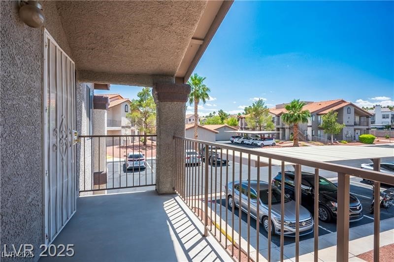 1575 West Warm Springs Road, Unit 2122 Henderson, NV 89014 - Photo 22 of 24 Balcony with a residential view