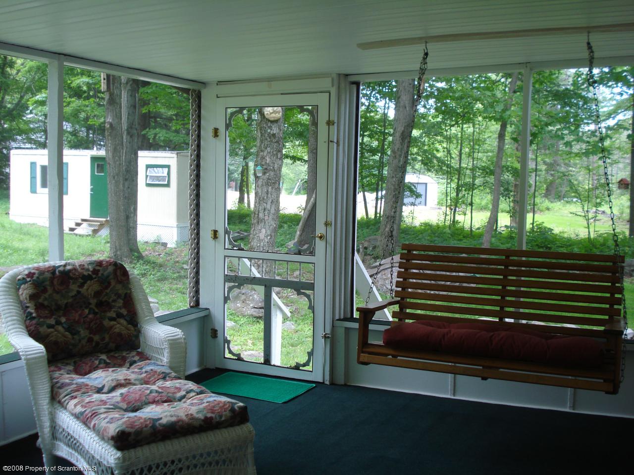 759 Spring Hill Road Sterling, PA 18463 - Photo 3 of 16 a bedroom with a bed and a window