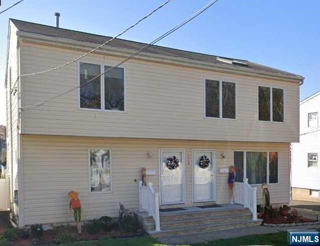 110 Church Street, Unit 1 Lodi, NJ 07644 - Photo 1 of 7 a front view of a house with stairs
