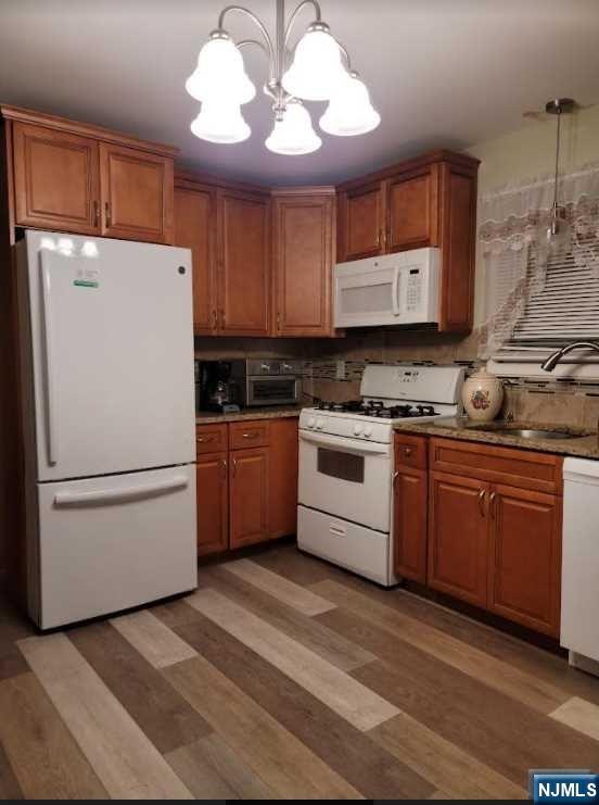 110 Church Street, Unit 1 Lodi, NJ 07644 - Photo 7 of 7 a kitchen with cabinets appliances and a counter top space