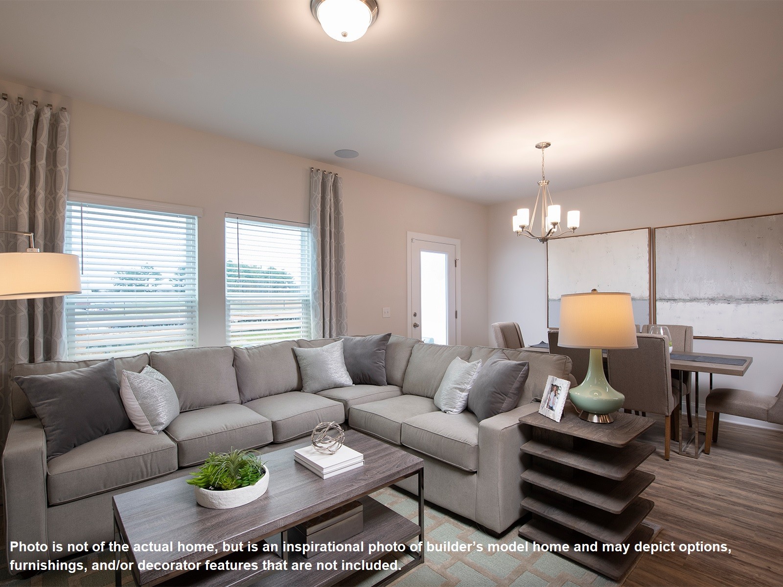 738 Prairie View Drive Columbia, TN 38401 - Photo 6 of 13 a living room with furniture a chandelier and a large window