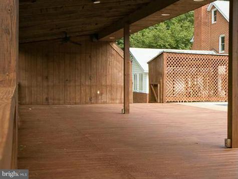9182 Dahlgren Road King George, VA 22485 - Photo 29 of 30 Pool with Poolhouse and Large Deck