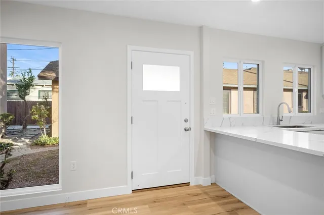 a view of a kitchen from the hallway