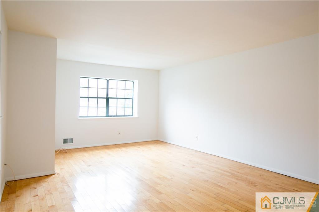 5106 Hana Road Edison, NJ 08817 - Photo 1 of 23 an empty room with a window
