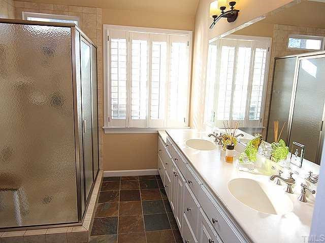 2936 Tillinghast Trail Raleigh, NC 27613 - Photo 7 of 12 Master bathroom has been totally redone by this owner. Tile floors,large shower and double vanity. Other
