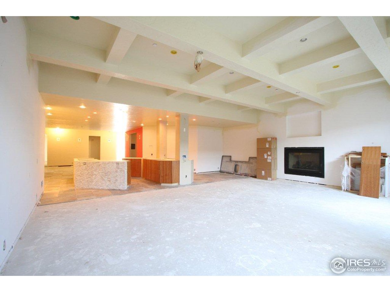 5385 Lookout Ridge Drive Boulder, CO 80301 - Photo 20 of 24 a large room with chandelier and a couch