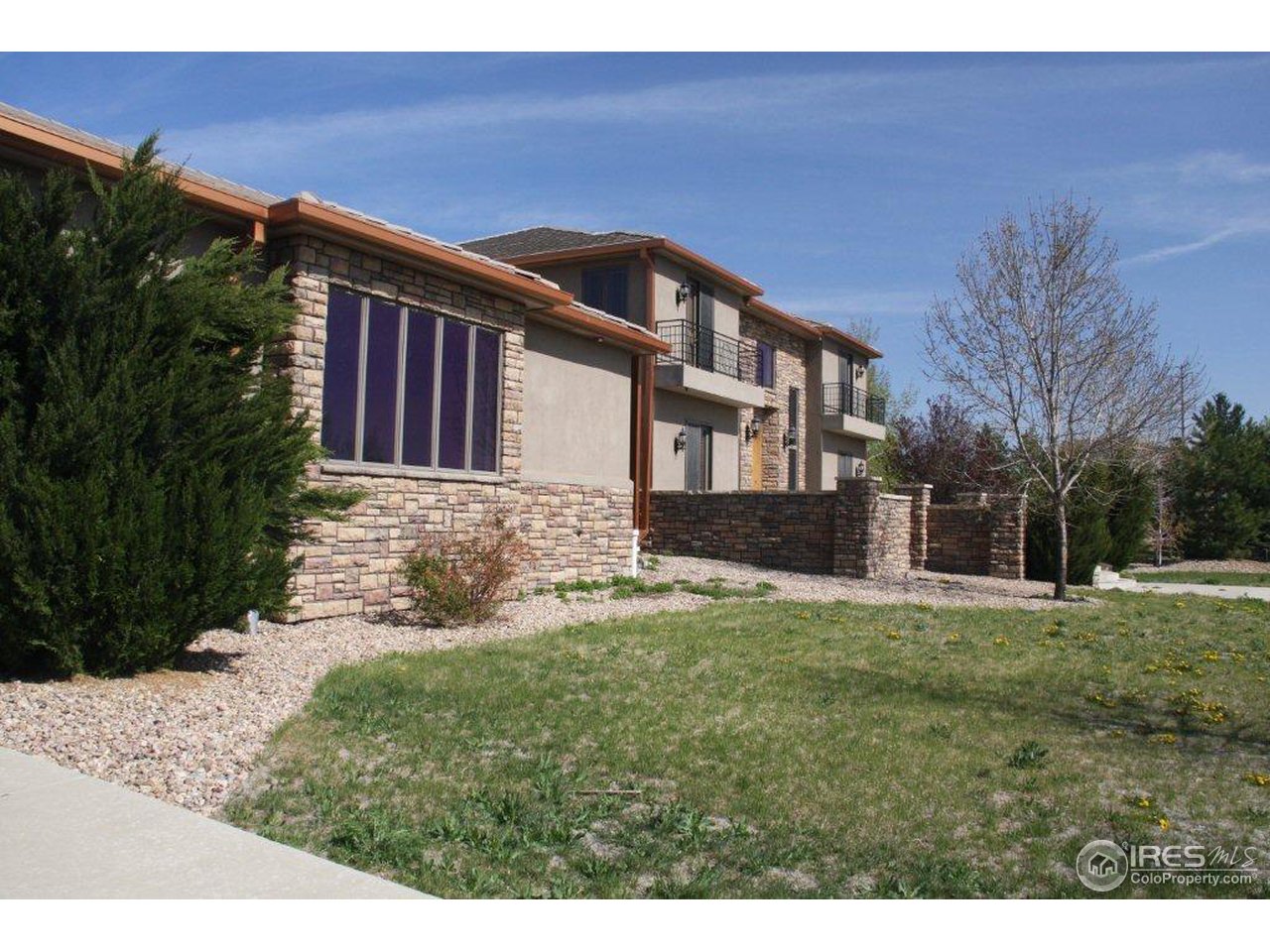 5385 Lookout Ridge Drive Boulder, CO 80301 - Photo 3 of 24 a front view of a house with a yard