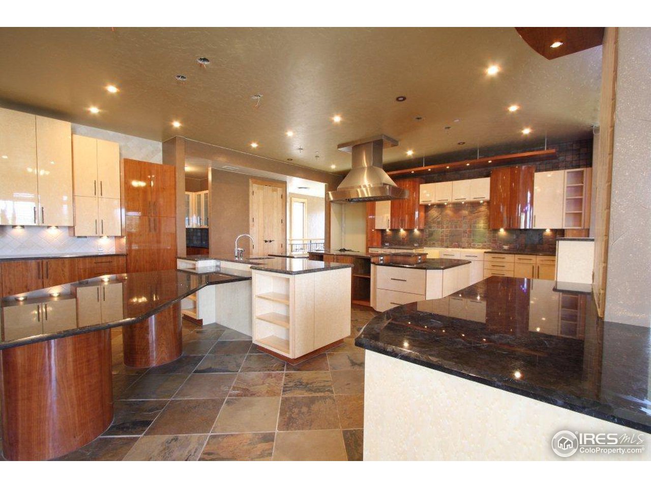 5385 Lookout Ridge Drive Boulder, CO 80301 - Photo 6 of 24 a kitchen with a sink and a refrigerator