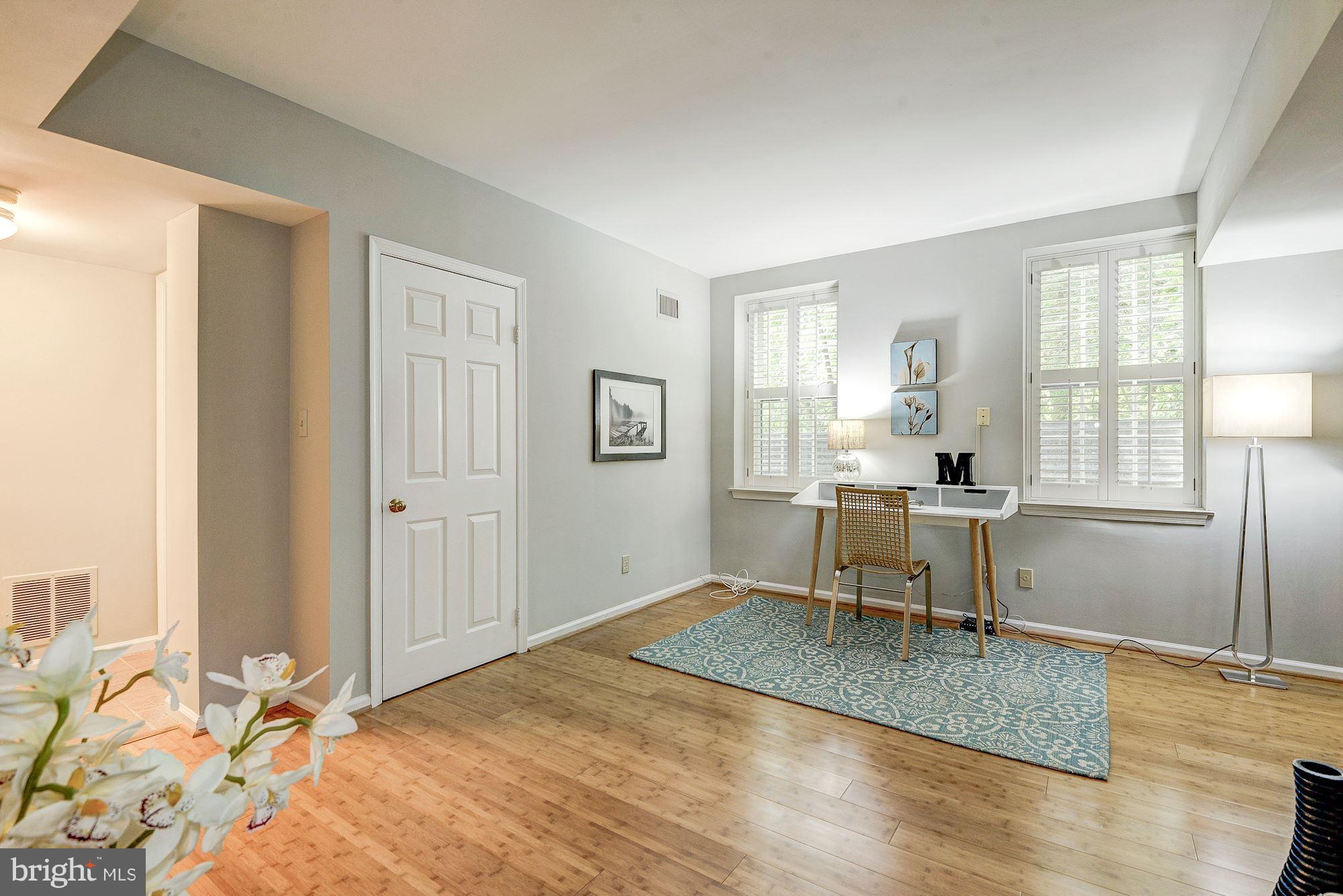 3500 39th Street Northwest, Unit B668 Washington, DC 20016 - Photo 20 of 29 a view of a livingroom with furniture and a window