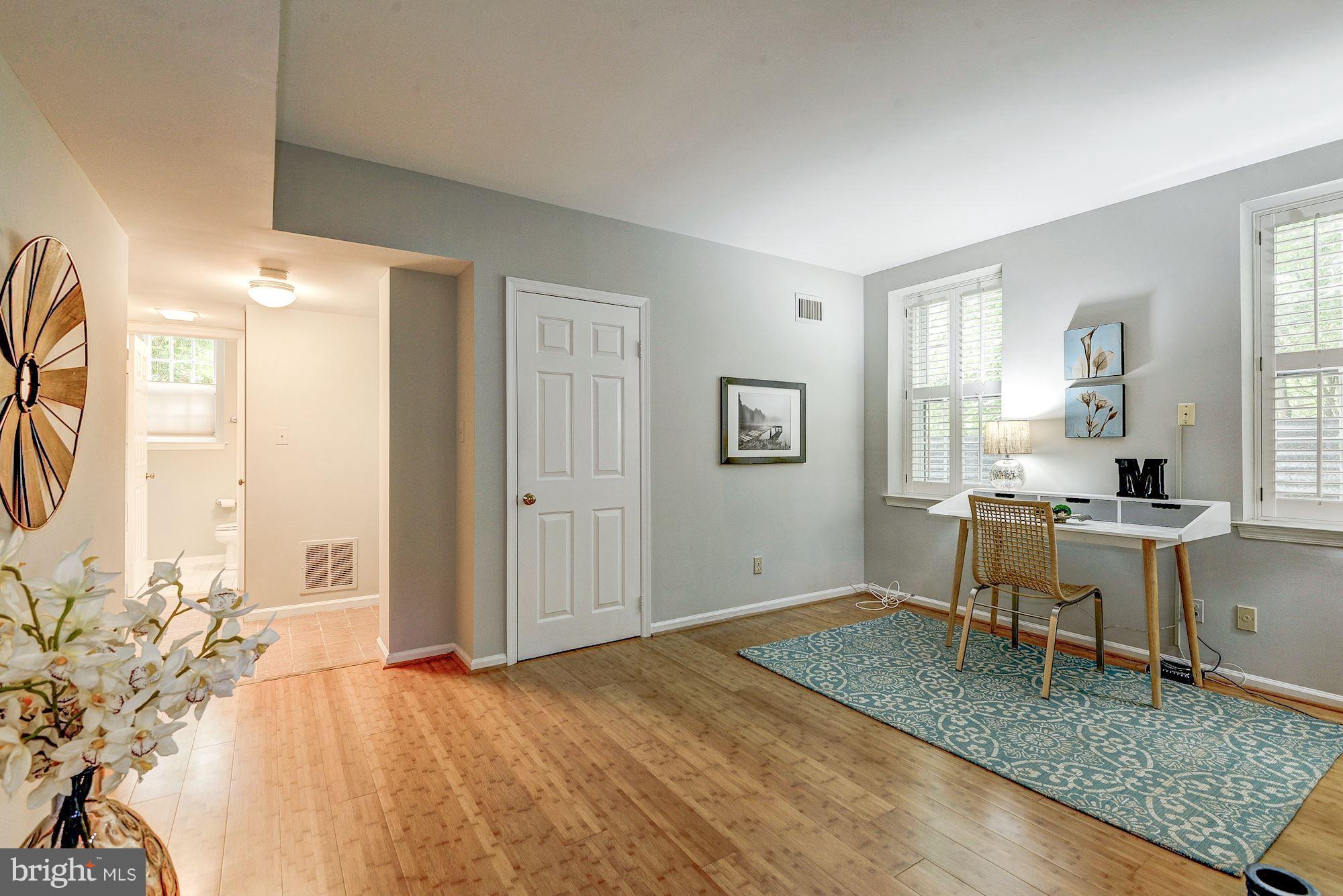 3500 39th Street Northwest, Unit B668 Washington, DC 20016 - Photo 21 of 29 a view of a livingroom with furniture and window