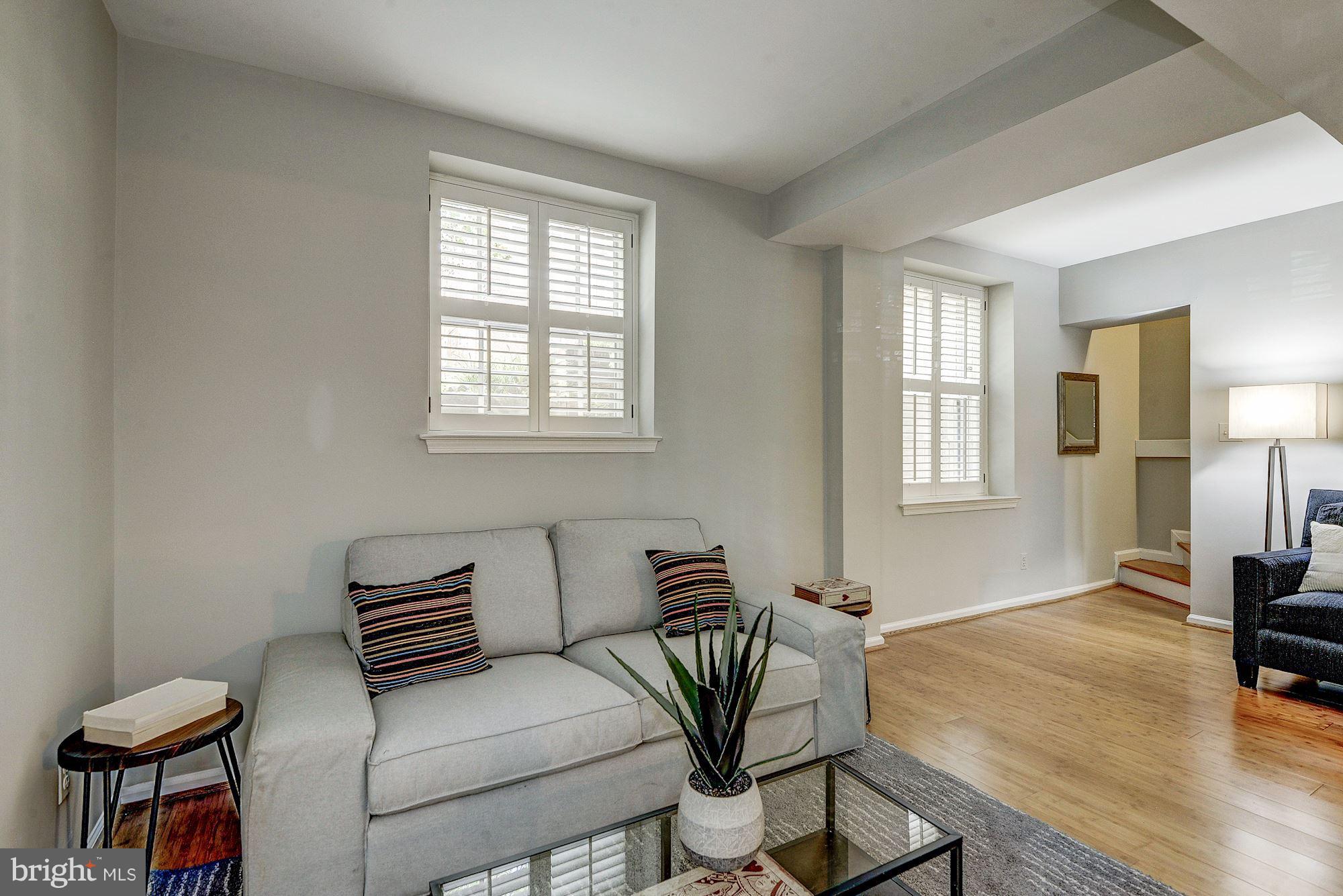 3500 39th Street Northwest, Unit B668 Washington, DC 20016 - Photo 24 of 29 a view of a livingroom with furniture and a window