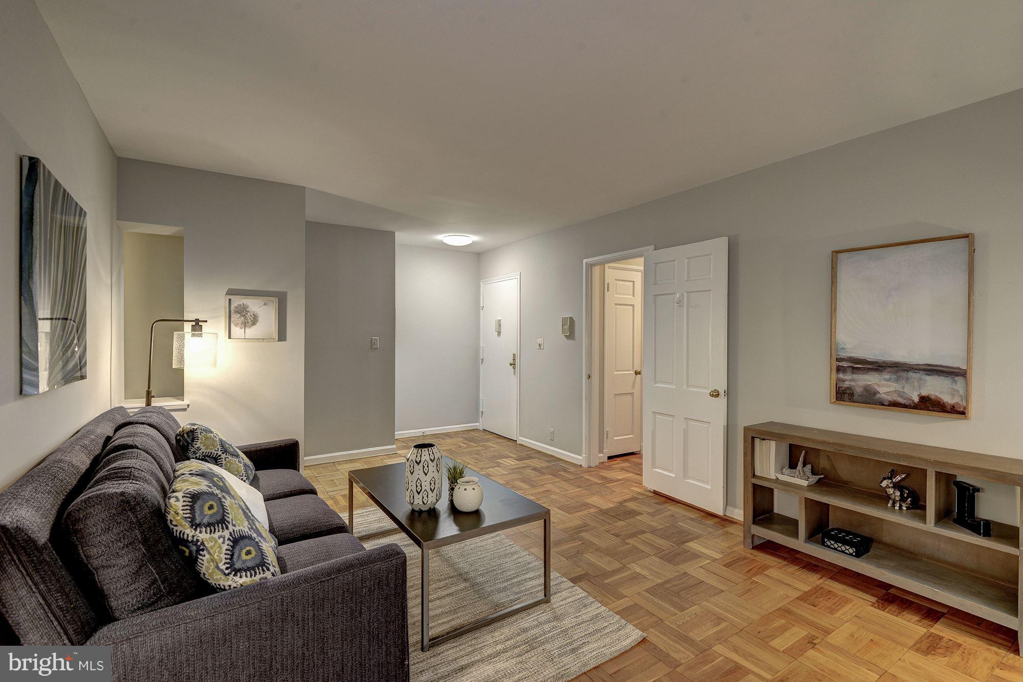 3500 39th Street Northwest, Unit B668 Washington, DC 20016 - Photo 7 of 29 a living room with furniture