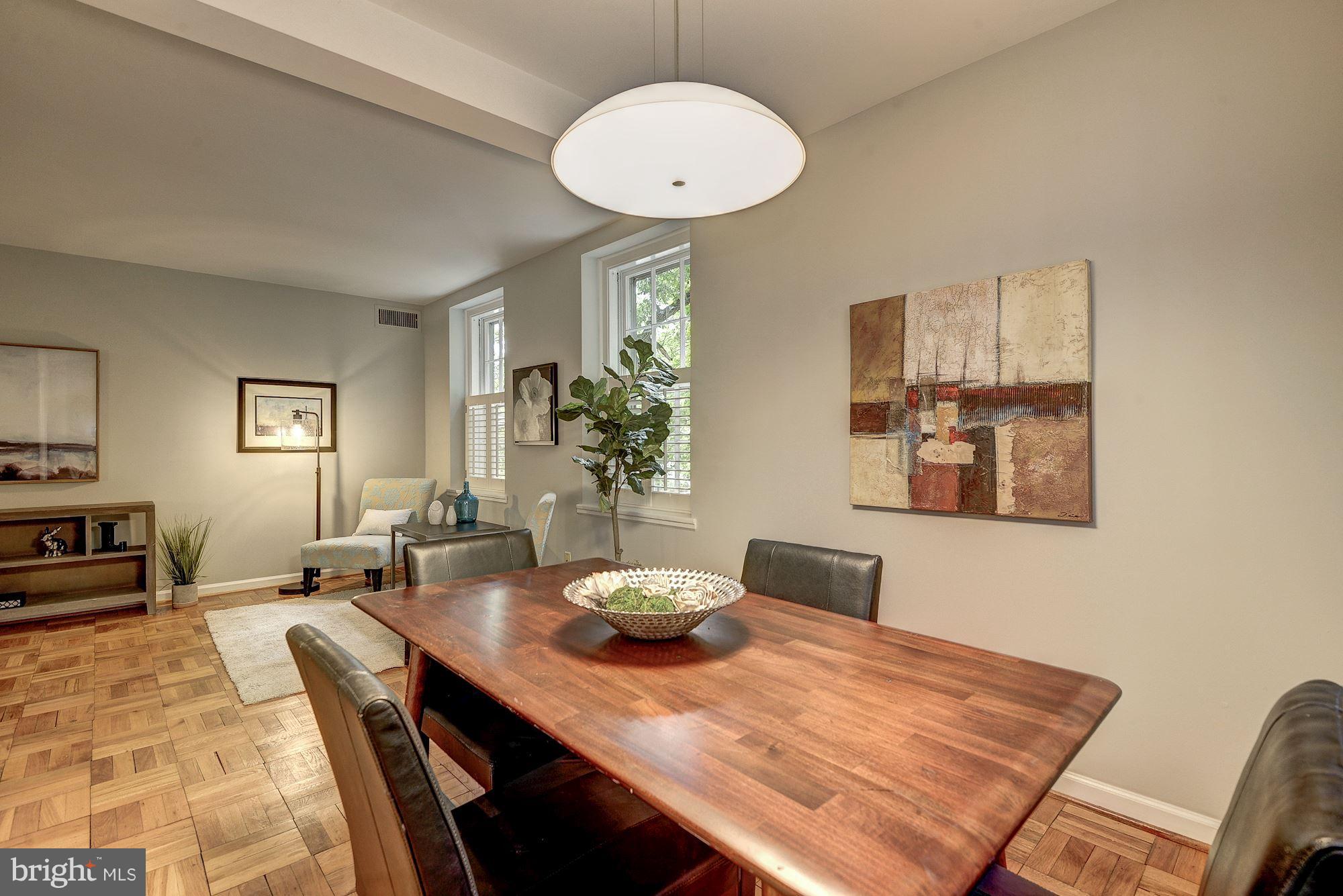 3500 39th Street Northwest, Unit B668 Washington, DC 20016 - Photo 9 of 29 a view of a dining room with furniture