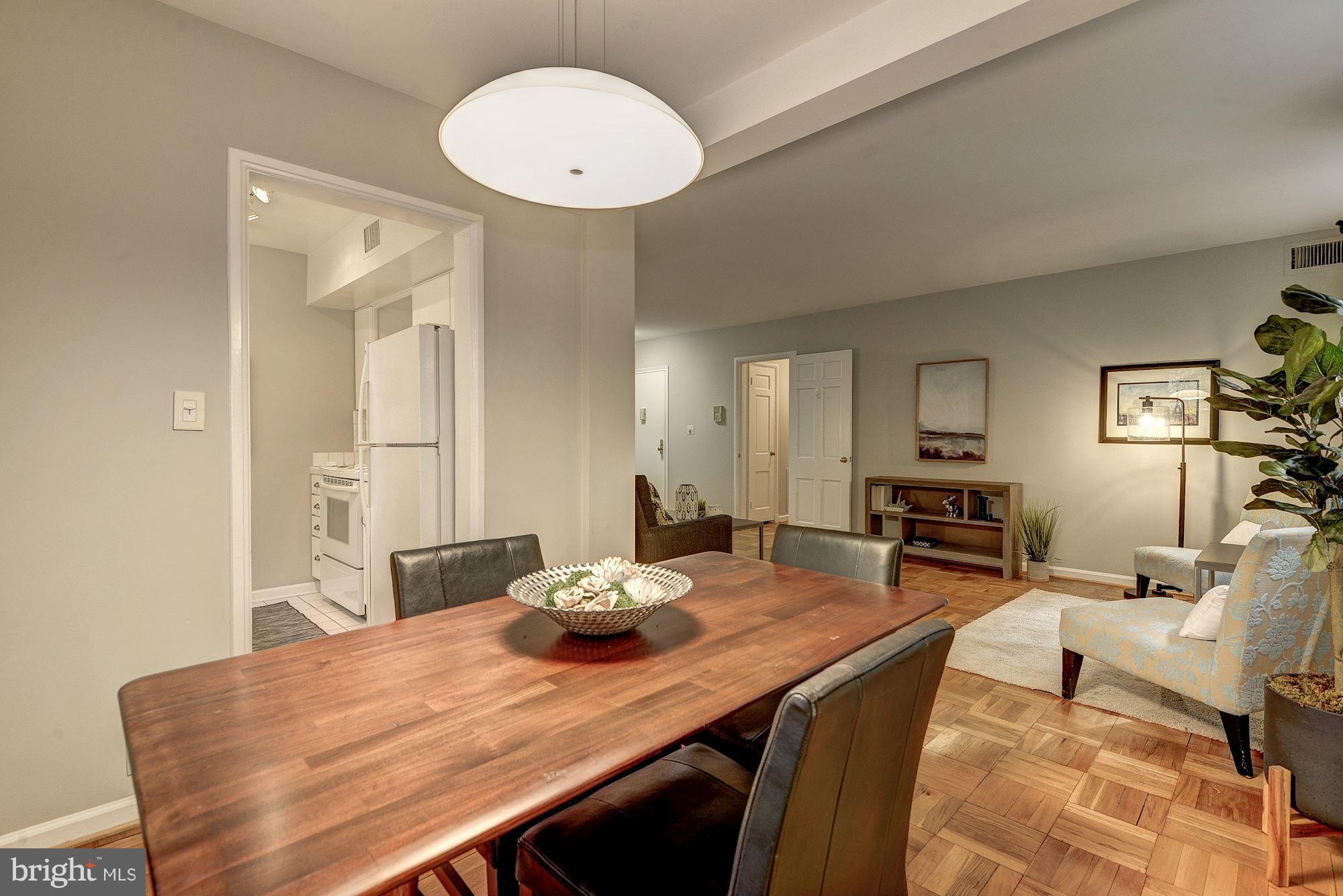 3500 39th Street Northwest, Unit B668 Washington, DC 20016 - Photo 10 of 29 a view of a dining room with furniture