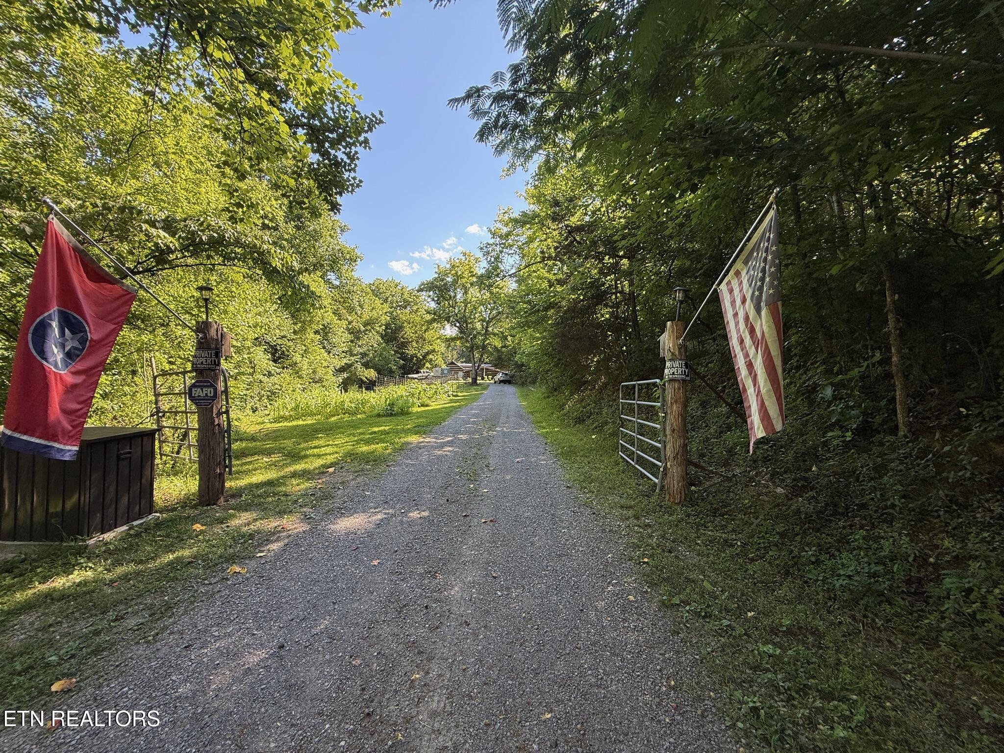 355 Lone Mountain Road Andersonville, TN 37705 - Photo 5 of 45 Gate/Gravel drive