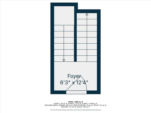 a picture of a bench in front of a building