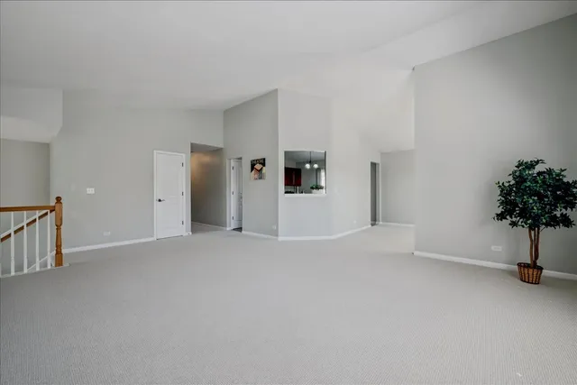 a view of empty room with potted plant