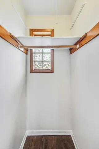 a view of walk in closet with window
