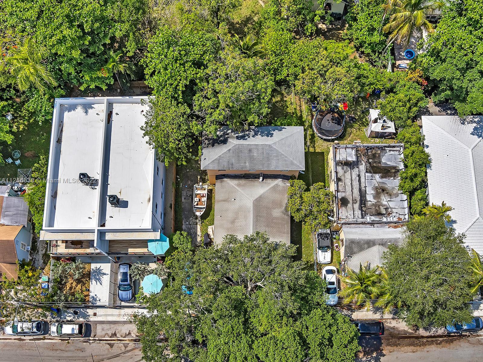 3628 Thomas Avenue Miami, FL 33133 - Photo 5 of 7 an aerial view of a house with outdoor space and street view