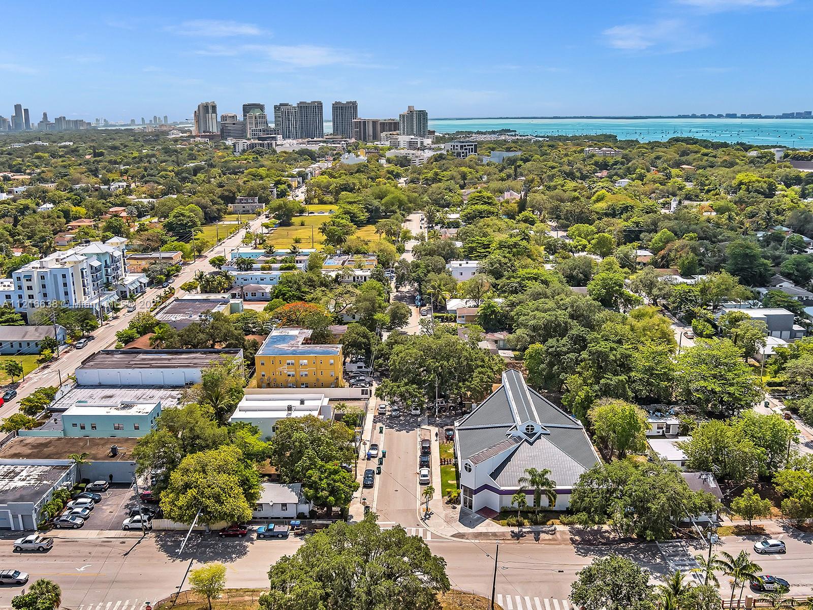 3628 Thomas Avenue Miami, FL 33133 - Photo 7 of 7 an aerial view of residential building with parking space