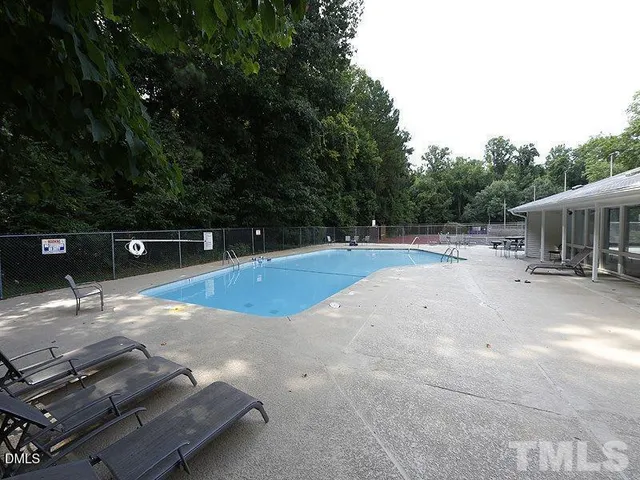 a view of outdoor space and swimming pool