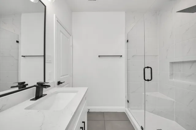 a bathroom with a sink and a tub