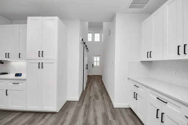 a view of a hallway with closet