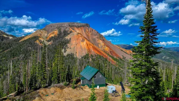 a view of a back yard of the house