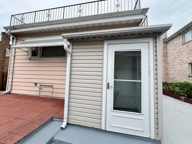a view of a house with a deck