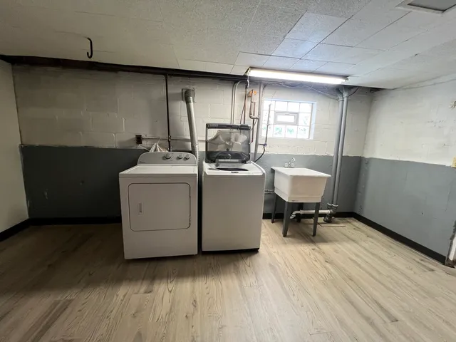 a view of kitchen and wooden floor