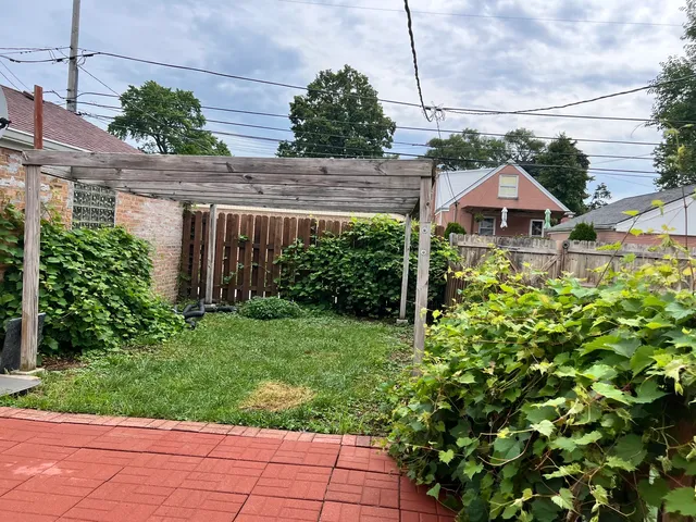 a front view of house with a yard