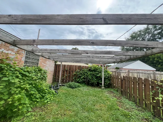 a view of a backyard with plants