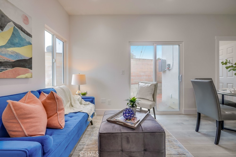 6439 Mohawk Road Westminster, CA 92683 - Photo 11 of 41 a living room with furniture and a window