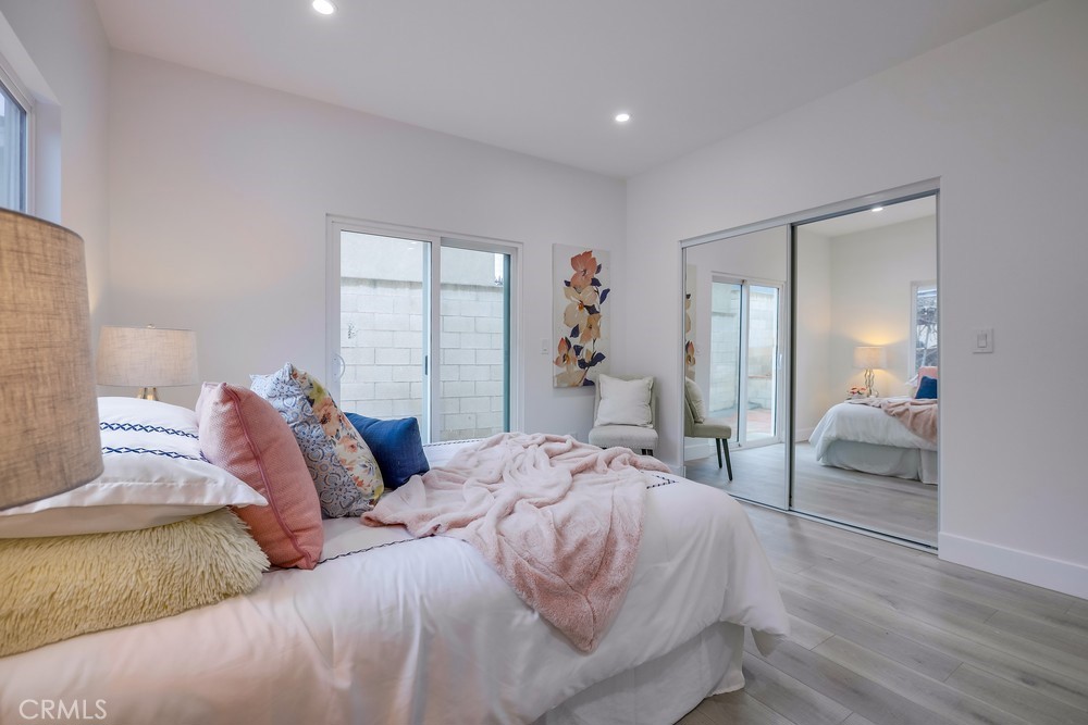 6439 Mohawk Road Westminster, CA 92683 - Photo 22 of 41 a bedroom with a bed and a couch