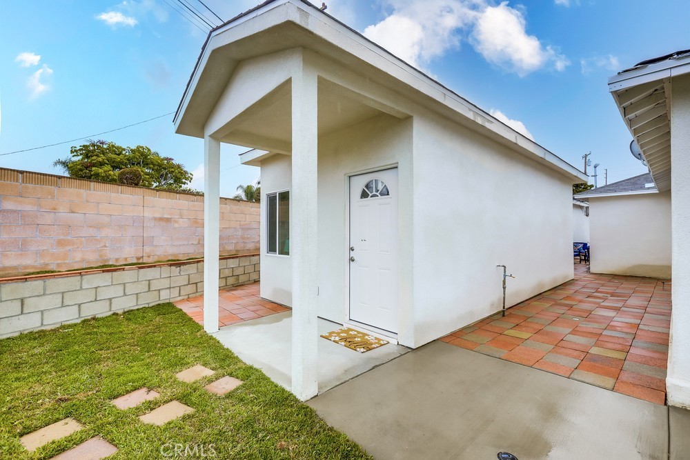 6439 Mohawk Road Westminster, CA 92683 - Photo 9 of 41 a front view of a house with a yard