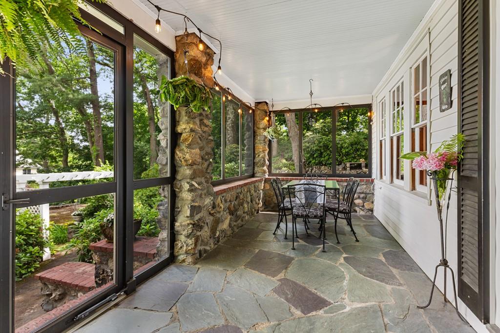 19 Walnut Street Lexington, MA 02421 - Photo 4 of 22 a view of a patio with a table chairs and backyard
