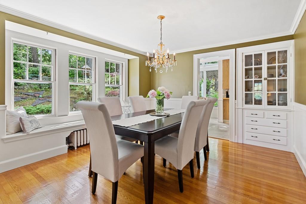 19 Walnut Street Lexington, MA 02421 - Photo 8 of 22 a view of a dining room with furniture window and wooden floor